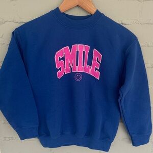 Prince Peter Blue Sweatshirt with Pink 'Smile' Graphic